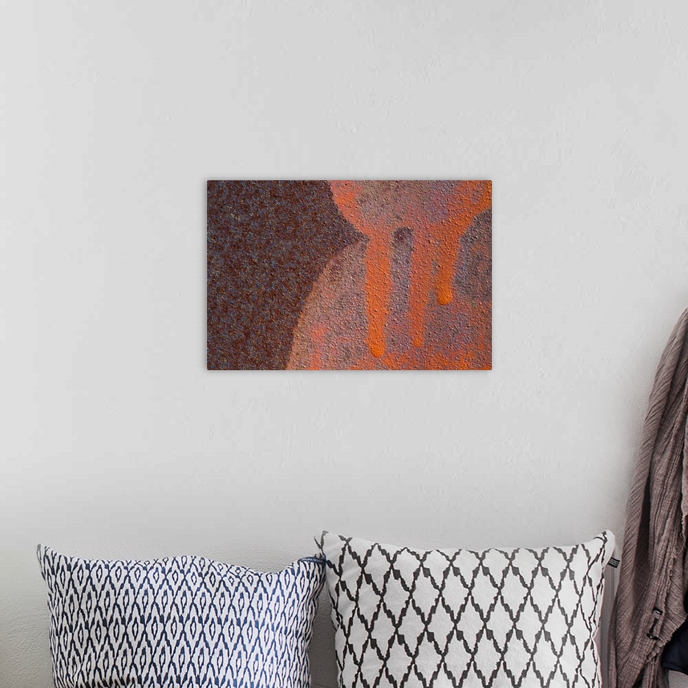 A bohemian room featuring Details of rust and paint on metal.