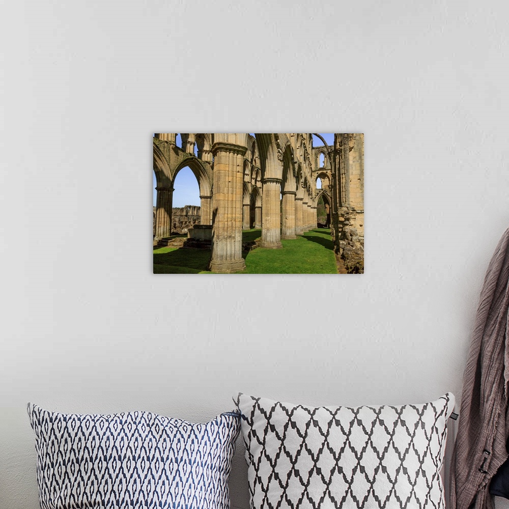 A bohemian room featuring England, North Yorkshire, Rievaulx. 13th c. Cistercian ruins of Rievaulx Abbey. English Heritage ...