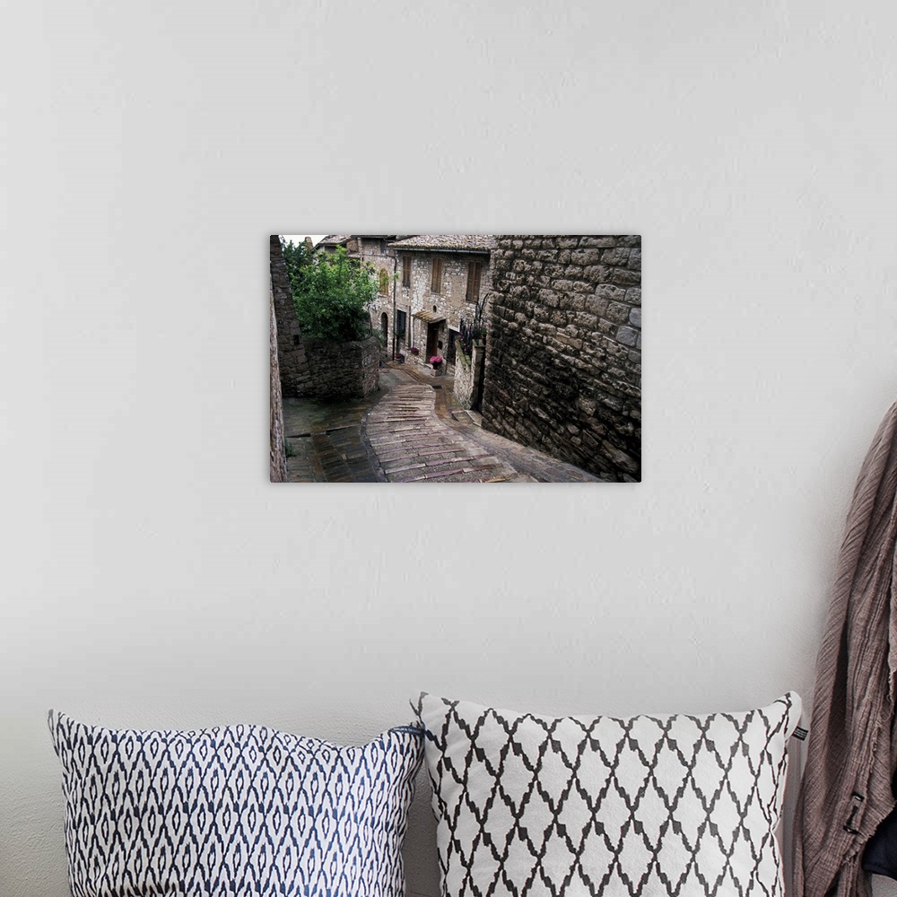 A bohemian room featuring Europe, Italy, Umbria, Assisi. Steep medieval walkway.