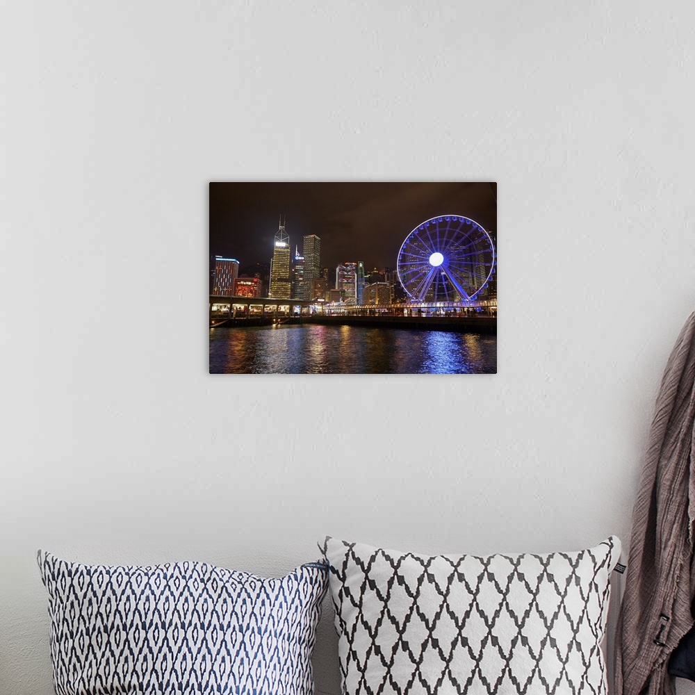 A bohemian room featuring Victoria Harbour, Hong Kong Observation Wheel and skyscrapers, Central, Hong Kong Island, Hong Ko...