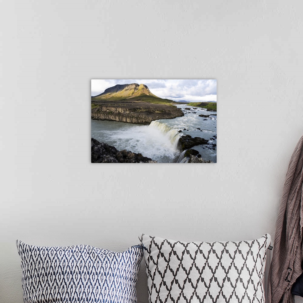 A bohemian room featuring Iceland, Southern Highlands, Pjorsa River. The Pjorsa River flowing into the Pjofafoss waterfall ...