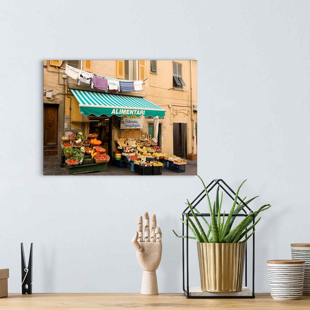 A bohemian room featuring Europe, Italy, Cinque Terre, Riomaggiore. A typical small grocery store.