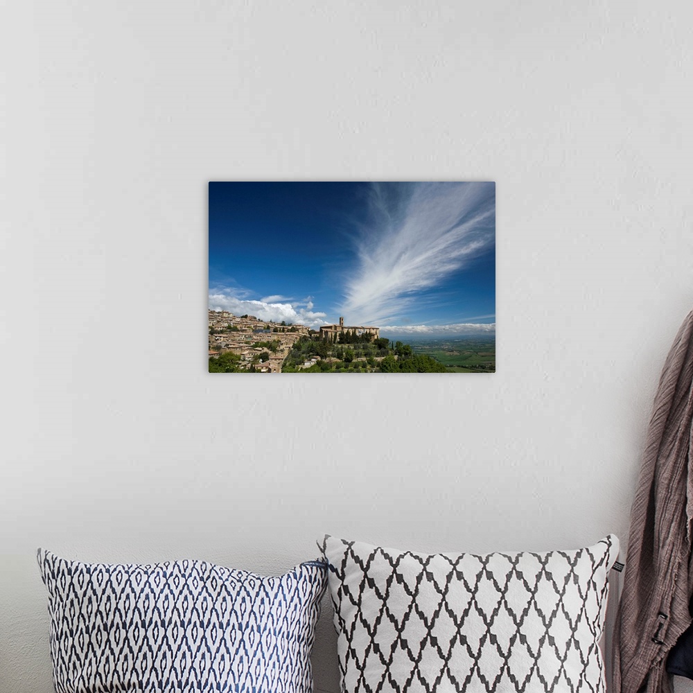 A bohemian room featuring Italy, Tuscany. Dramatic clouds over the hill town of Montalcino.