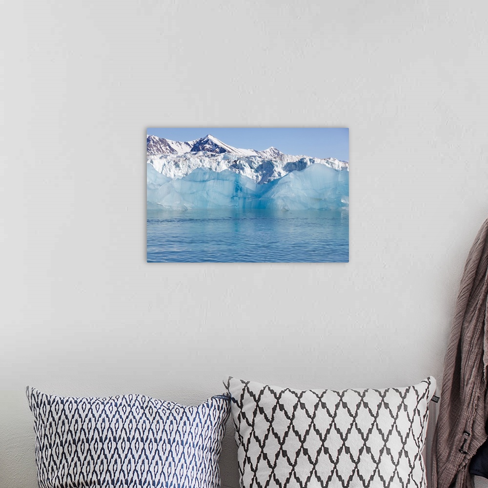 A bohemian room featuring Norway, Svalbard, ice at the base of the Monacobreen glacier.