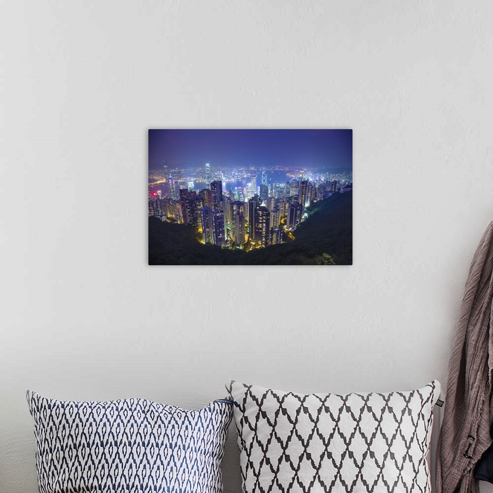 A bohemian room featuring China, Hong Kong. Overview of city at night.
