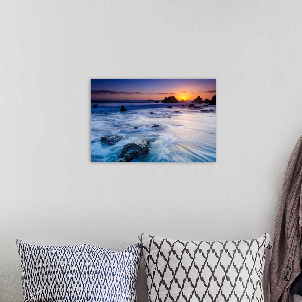 A bohemian room featuring Sea stacks at sunset, El Matador State Beach, Malibu, California USA.