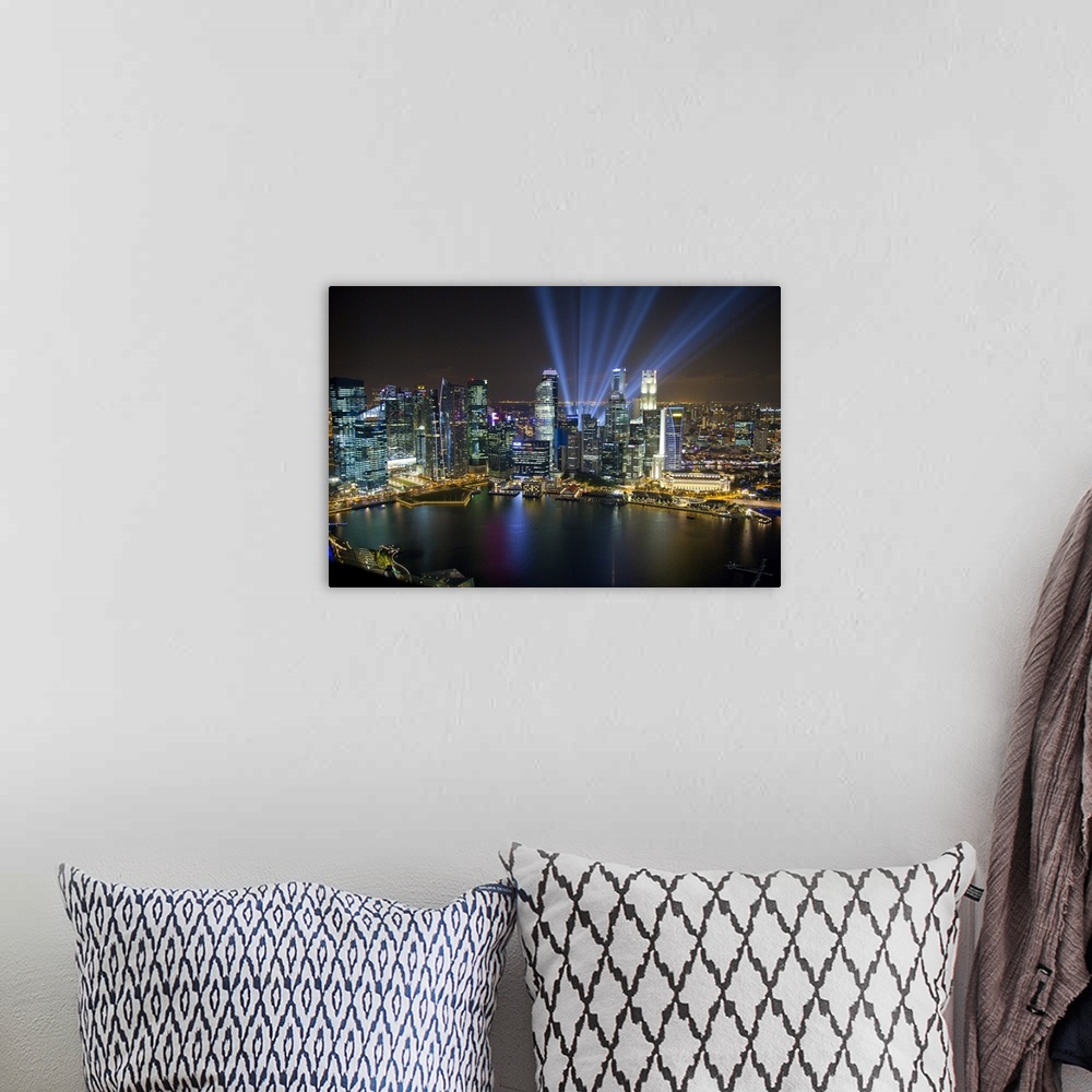 A bohemian room featuring Singapore. City at night.