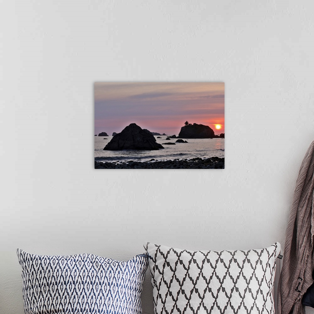 A bohemian room featuring Sunset and sea stacks along Northern California coastline, Crescent City