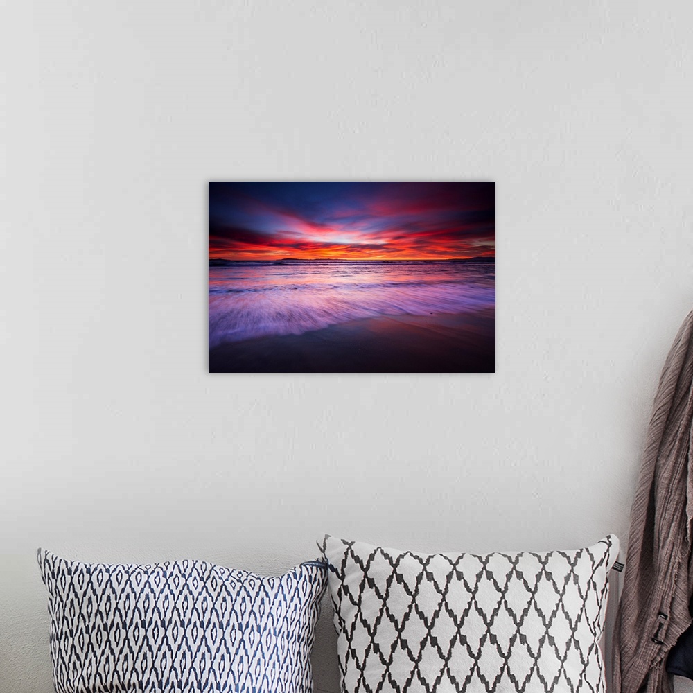 A bohemian room featuring Sunset over the Channel Islands from San Buenaventura State Beach, Ventura, California USA.