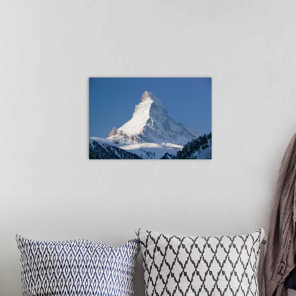 A bohemian room featuring SWITZERLAND-Wallis/Valais-ZERMATT:.The Matterhorn / Morning / Winter... Walter Bibikow 2005