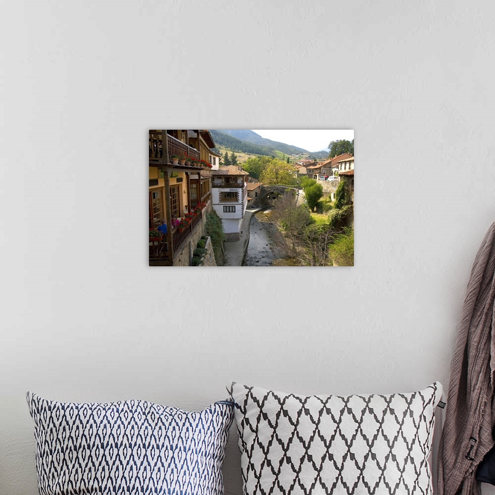 A bohemian room featuring The river Bullon in the village of Potes, Liebana, Cantabria, northwestern Spain.