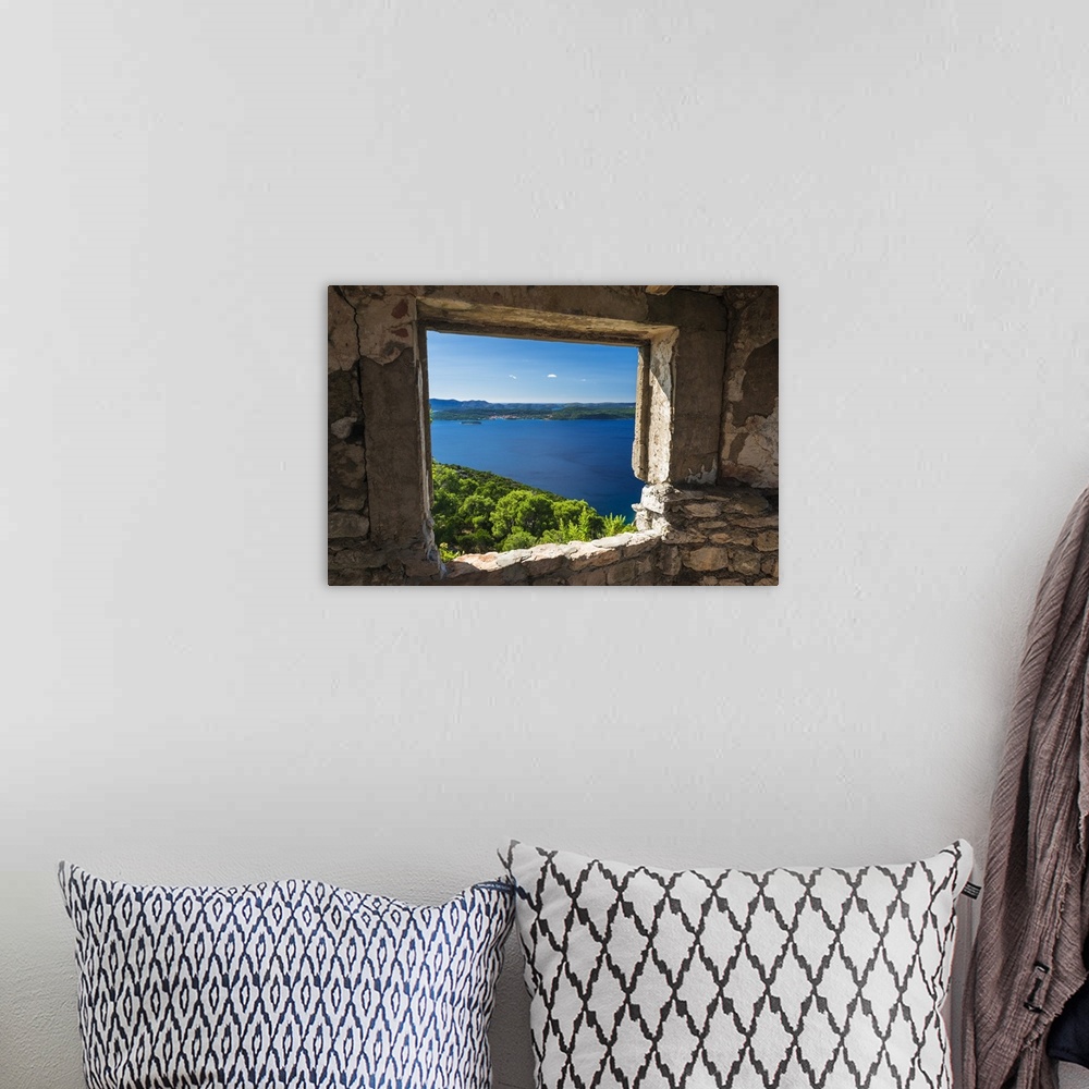 A bohemian room featuring Window view at St. Michael's Fort, Ugljan Island, Dalmatian Coast, Croatia.