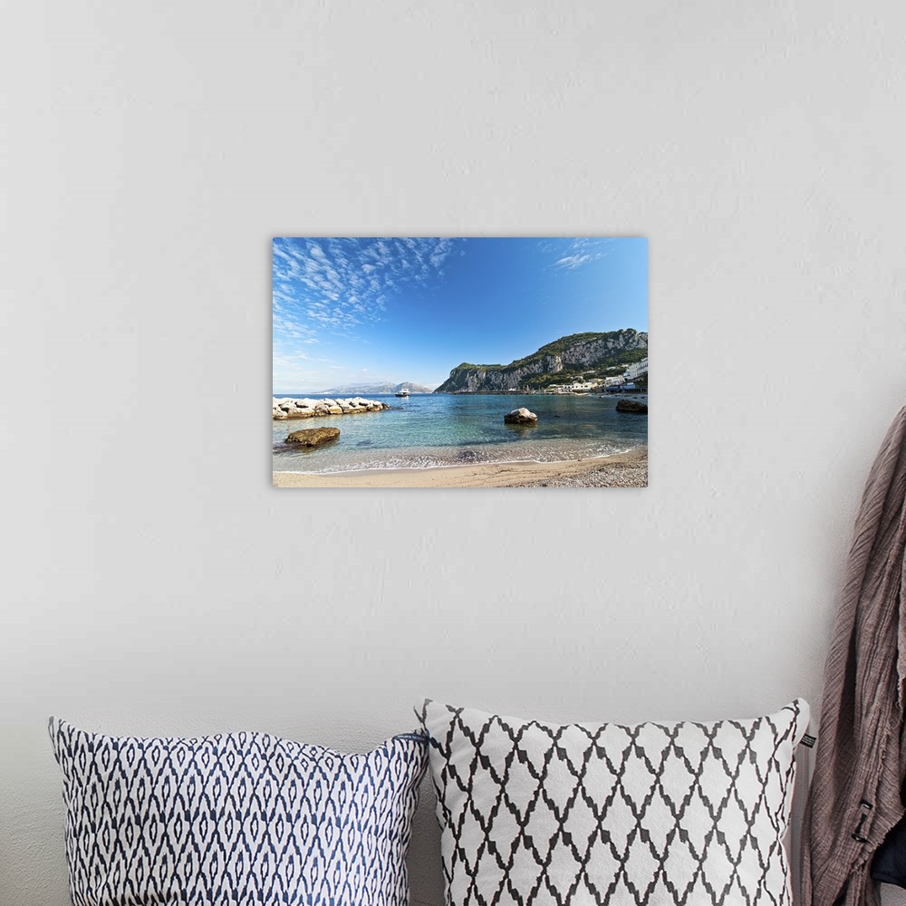 A bohemian room featuring Seascape shot on the island of Capri, Italy.
