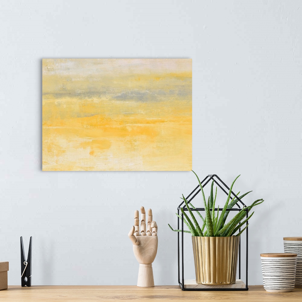 A bohemian room featuring Contemporary abstract painting using pale yellow and gray.