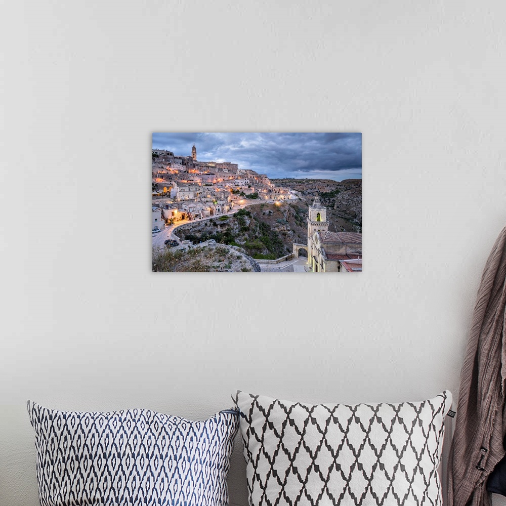 A bohemian room featuring Italy, Basilicata, Matera, Sasso Barisano view from Sasso Caveoso and, in the foreground, the pop...