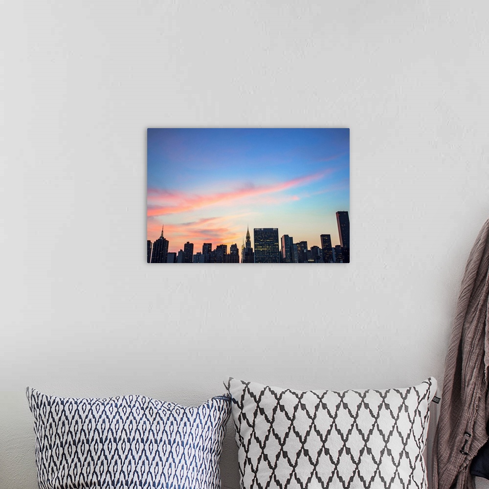 A bohemian room featuring New York, New York City, East Side skyline viewed from Long Island City