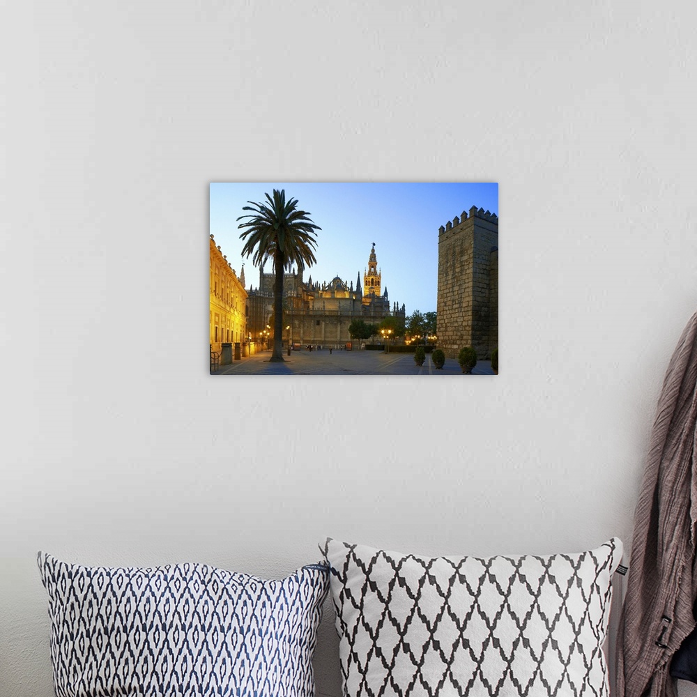 A bohemian room featuring Spain, Andalusia, Mediterranean area, Seville, Barrio Santa Cruz, Seville Cathedral, La Giralda