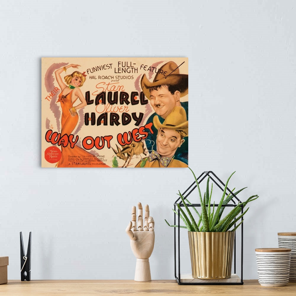 A bohemian room featuring WAY OUT WEST, US poster, Sharon Lynn (left), right from top: Oliver Hardy, Stan Laurel, 1937.
