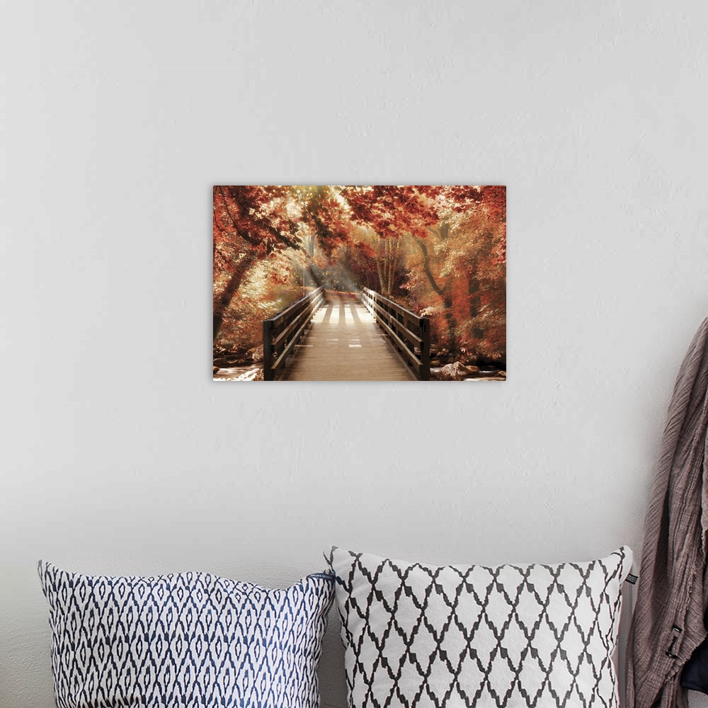A bohemian room featuring Photograph of a bridge going over a creek in woods covered in red Fall trees with beautiful sunli...