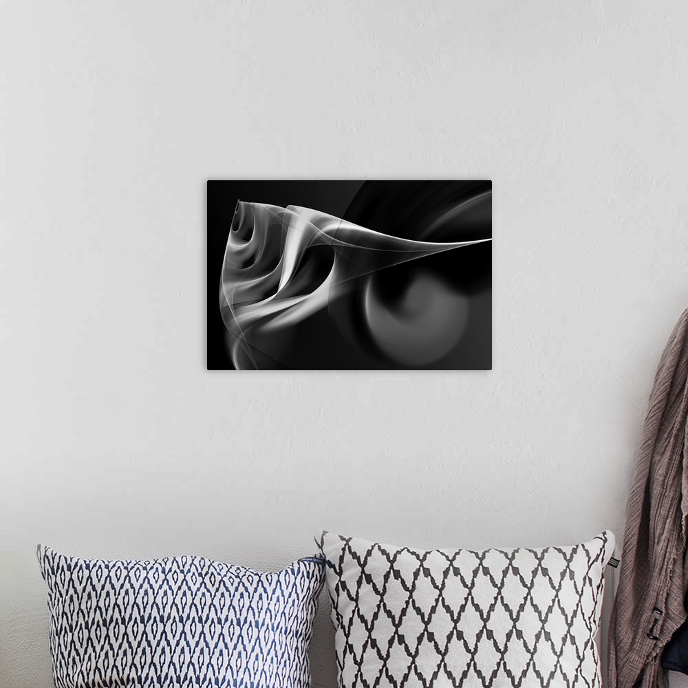 A bohemian room featuring Digital abstract artwork in shades of black and white, resembling smoke.