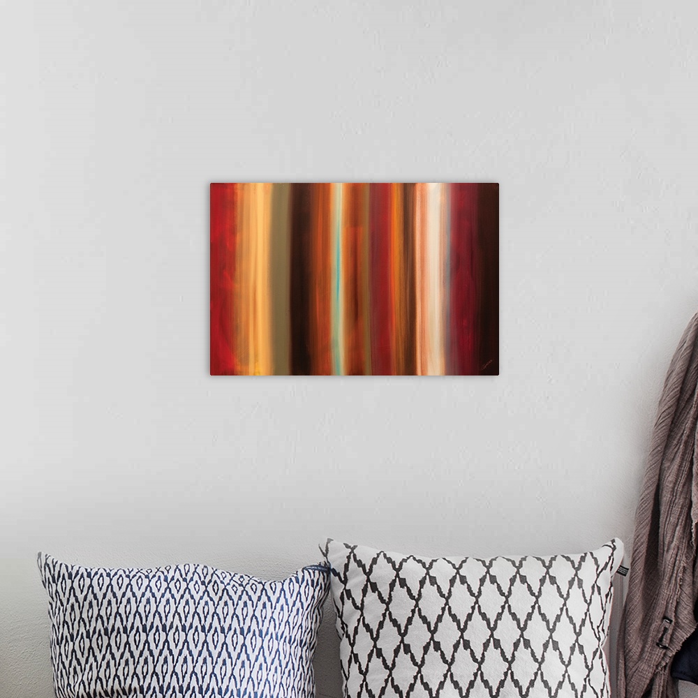 A bohemian room featuring Large abstract painting with vertical brushstroke lines in shades of red, yellow, brown, and oran...