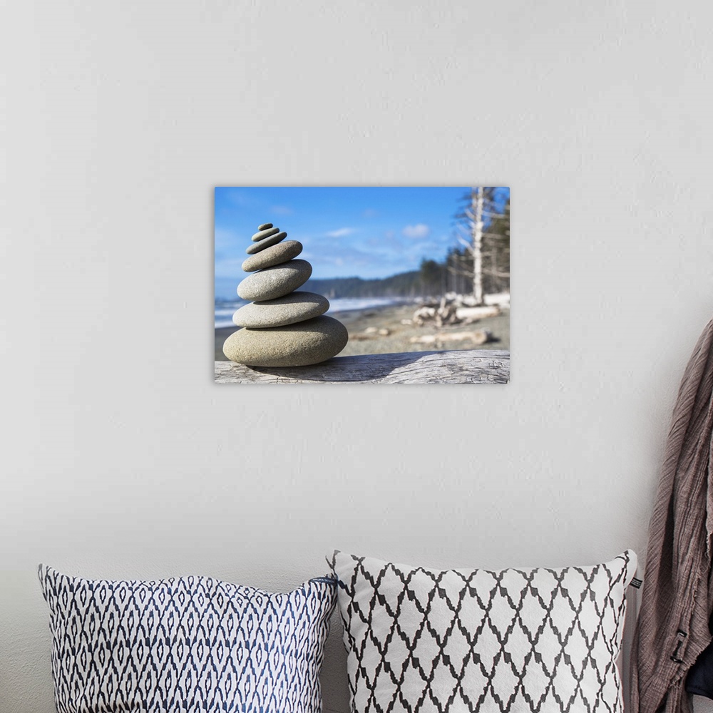A bohemian room featuring A pile of balancing smooth beach rocks near Rialto Beach, Olympic national park, in Washington, USA