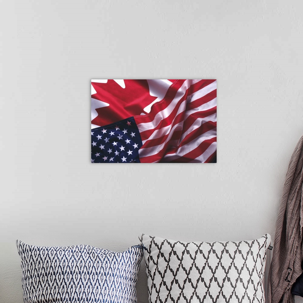 A bohemian room featuring An American and Canadian flag