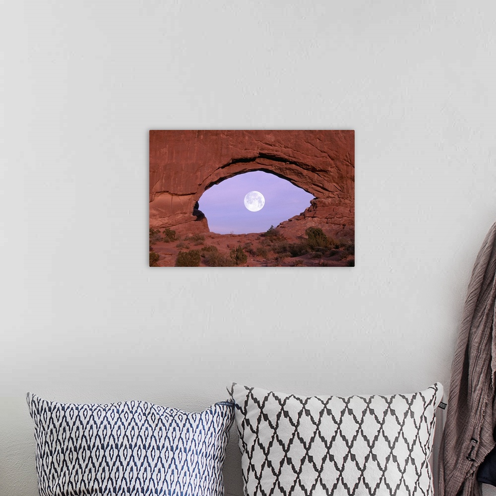 A bohemian room featuring PHOTOGRAPHER AT WINDOW AT ARCHES NATIONAL PARK