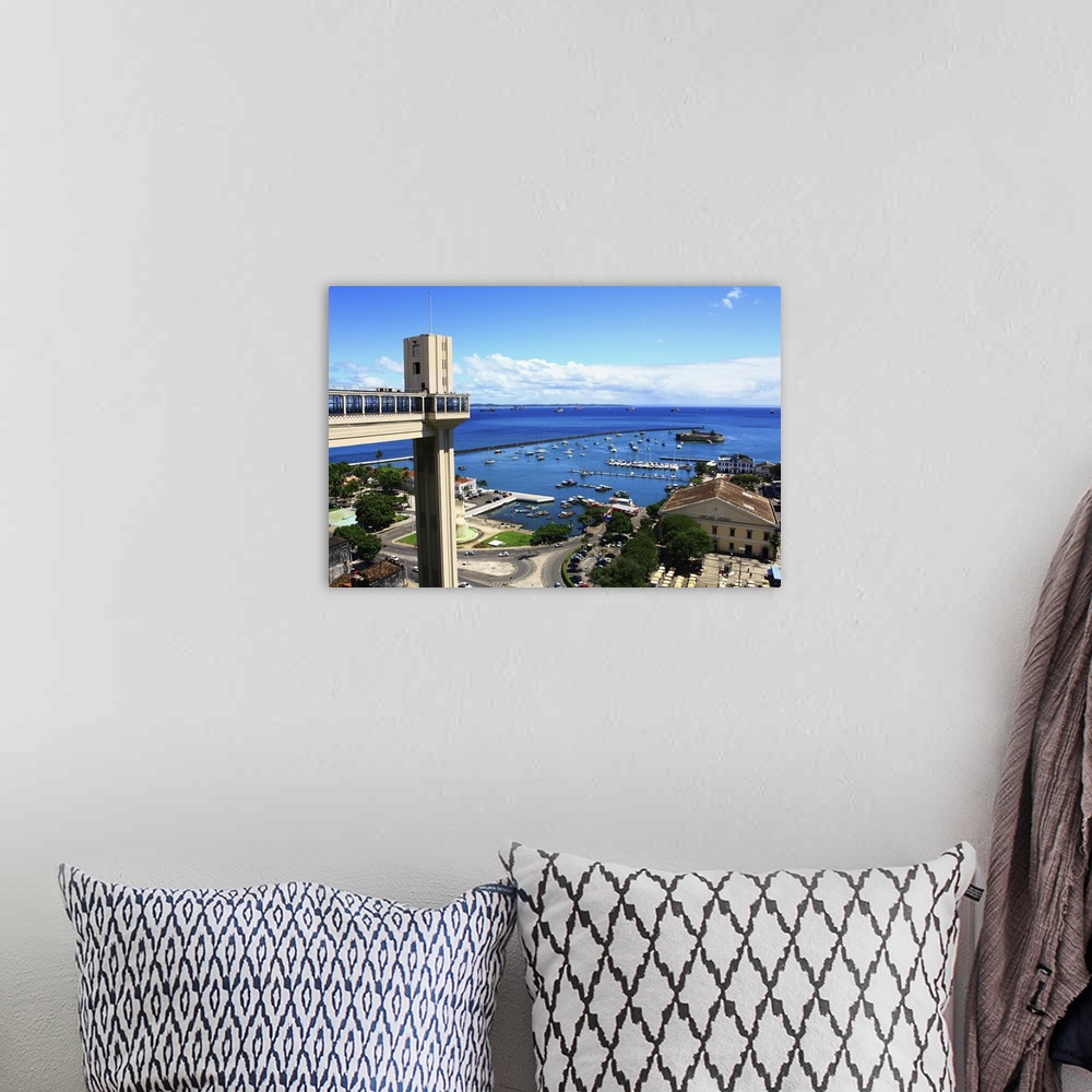 A bohemian room featuring View of the Bay of All Saints, the Mercado Modelo, blue sky, endless ocean and Elevador Lacerda. ...