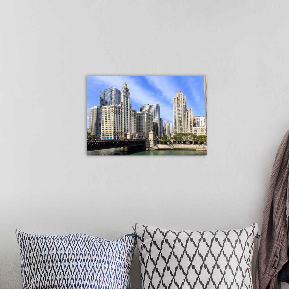 A bohemian room featuring The Wrigley Building and Tribune Tower stand north of the DuSable Bridge on the Chicago River, Ch...