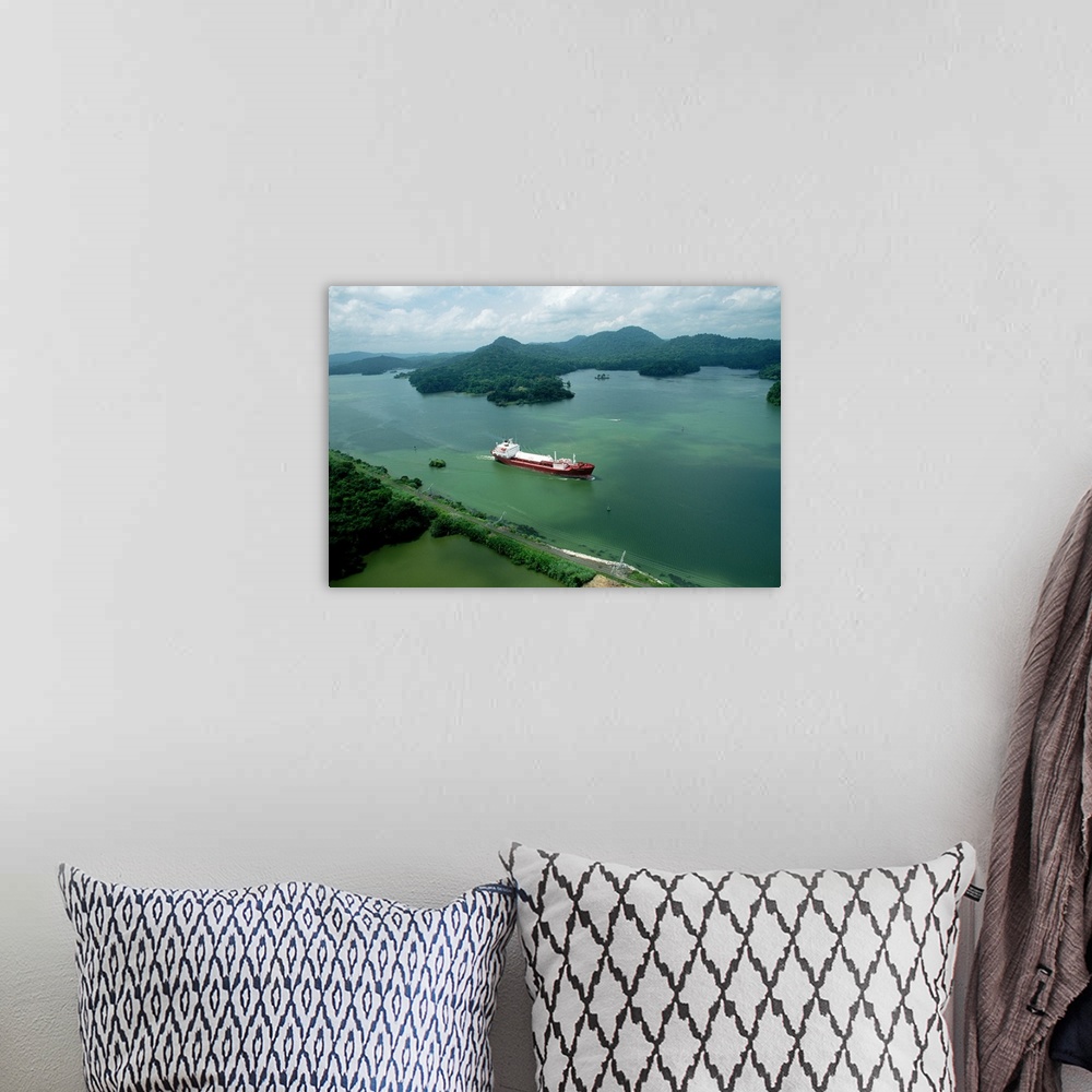 A bohemian room featuring Cargo Ship in the Panama Canal