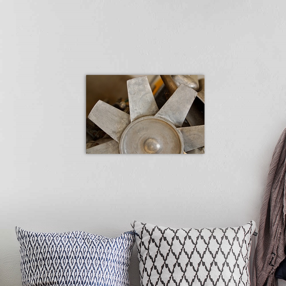 A bohemian room featuring Close-up of metal fan