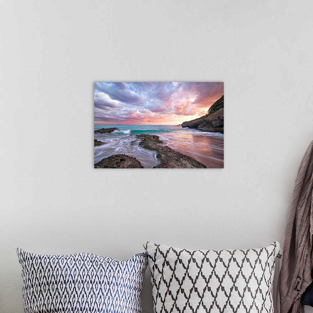 A bohemian room featuring Photograph of sandy inlet with water rushing in from the ocean under a cloudy sky at sunset.