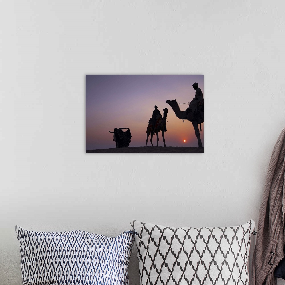 A bohemian room featuring Silhouette of Folks Dancer and camel herders at Thar desert.