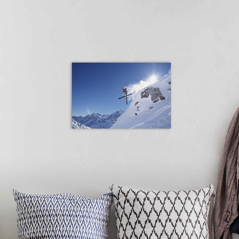 A bohemian room featuring Downhill skier in midair, low angle view
