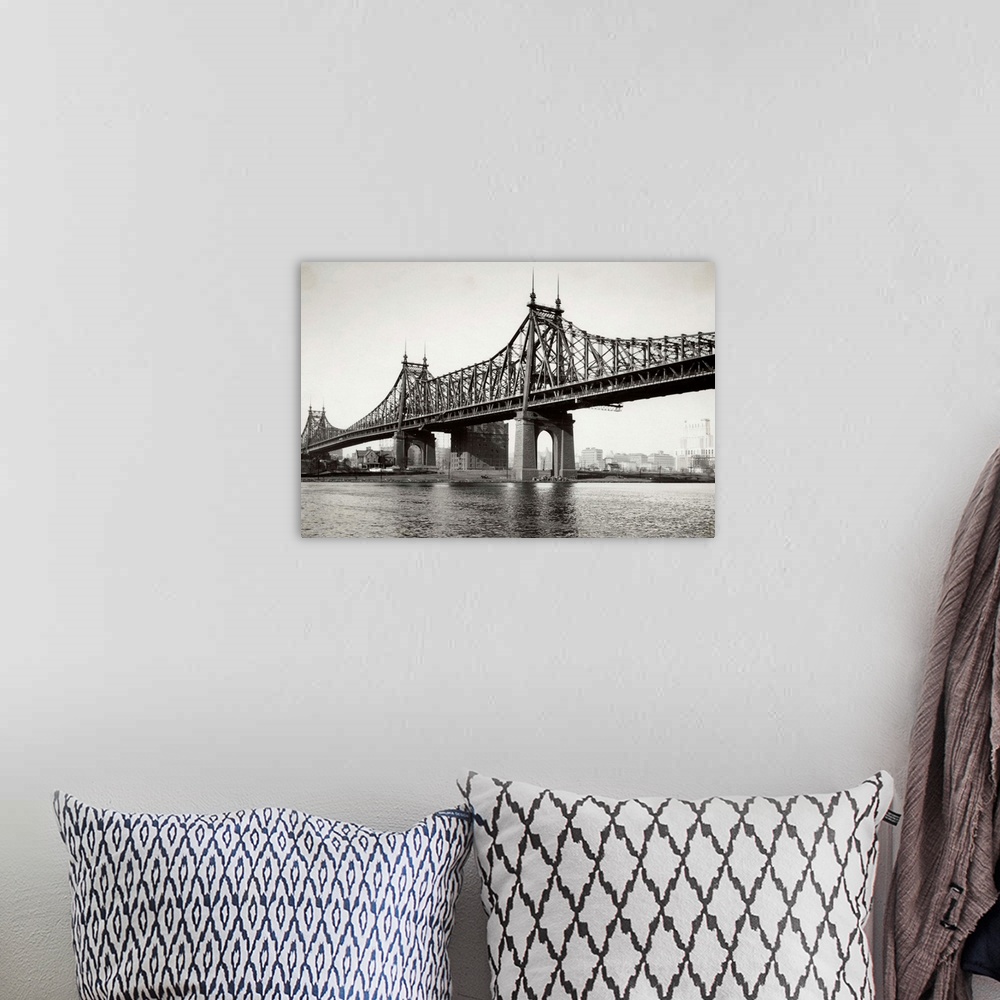 A bohemian room featuring Photo shows the Queensboro Bridge, the busiest bridge in the world, connecting Manhattan Island w...
