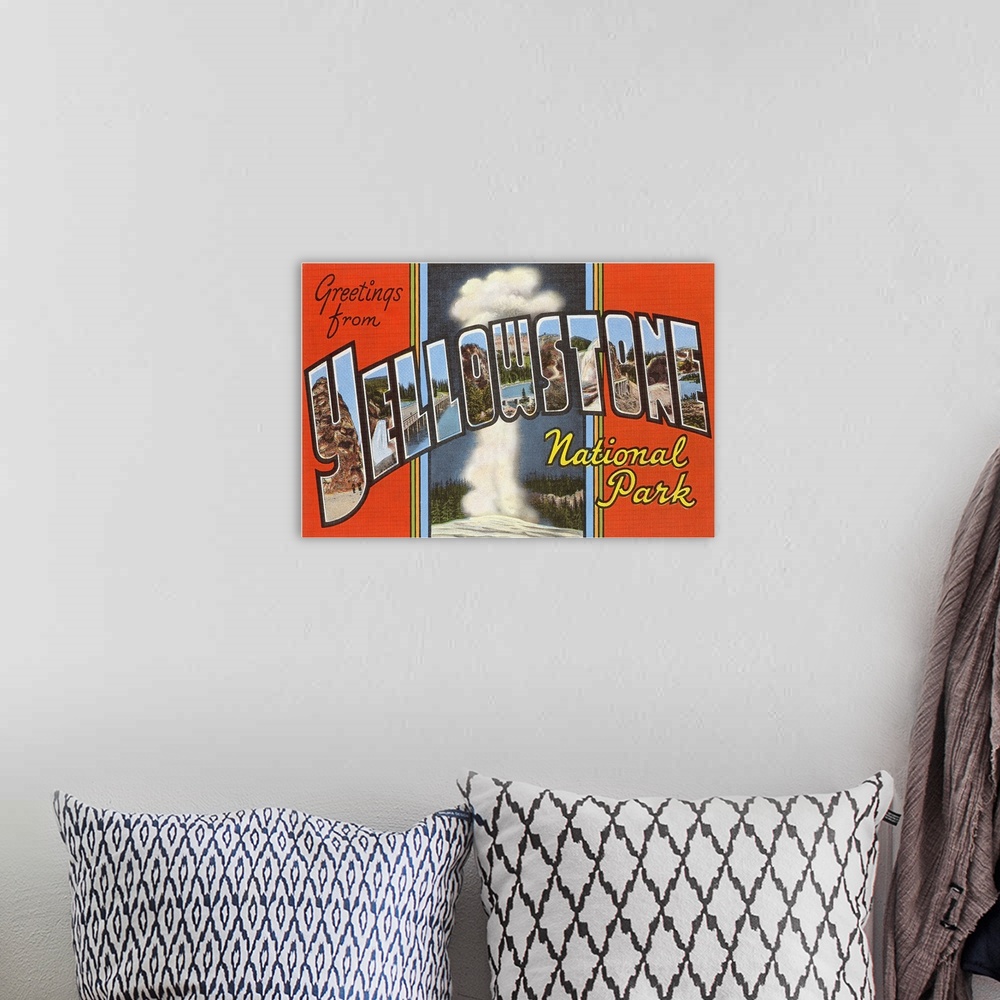 A bohemian room featuring Greetings from Yellowstone National Park large letter vintage postcard