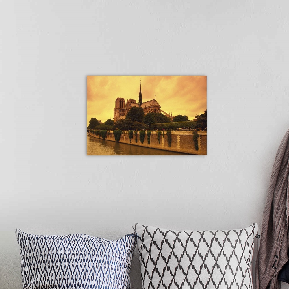 A bohemian room featuring Image of the Notre Dame and the Seine Next to It By Sunset, Low Angle View, Side View, Paris, France