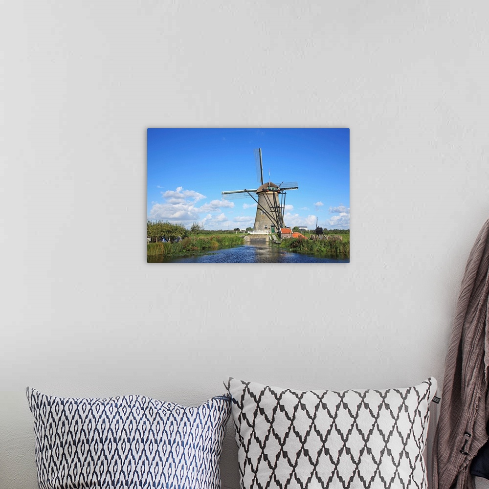 A bohemian room featuring The Netherlands, wind mill of Kinderdijk, UNESCO World Heritage