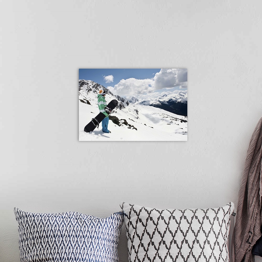 A bohemian room featuring Male snowboarder