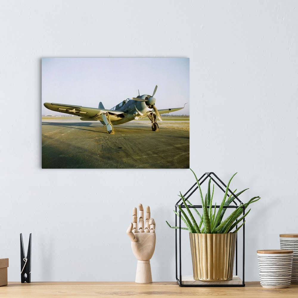 A bohemian room featuring Navy Curtiss-Wright SB2C Helldiver on a Tarmac