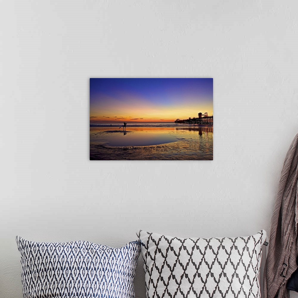 A bohemian room featuring Surfer enjoys another California sunset.