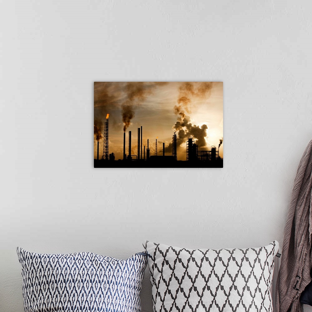A bohemian room featuring Netherlands Antilles, Curacao, Flames and smoke billow from natural gas flares and smokestacks at...