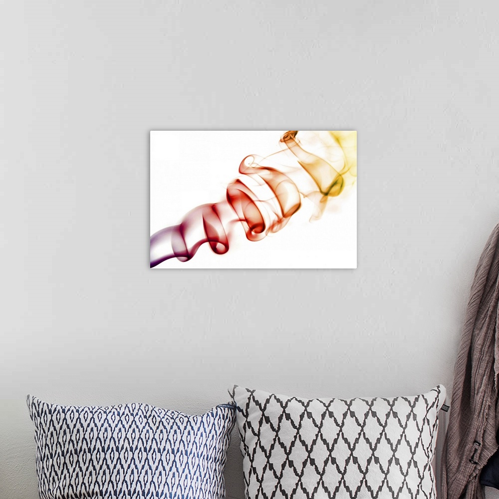 A bohemian room featuring Abstract image of smoke curls isolated against white and coloured Purple/Red/Orange/Yellow.