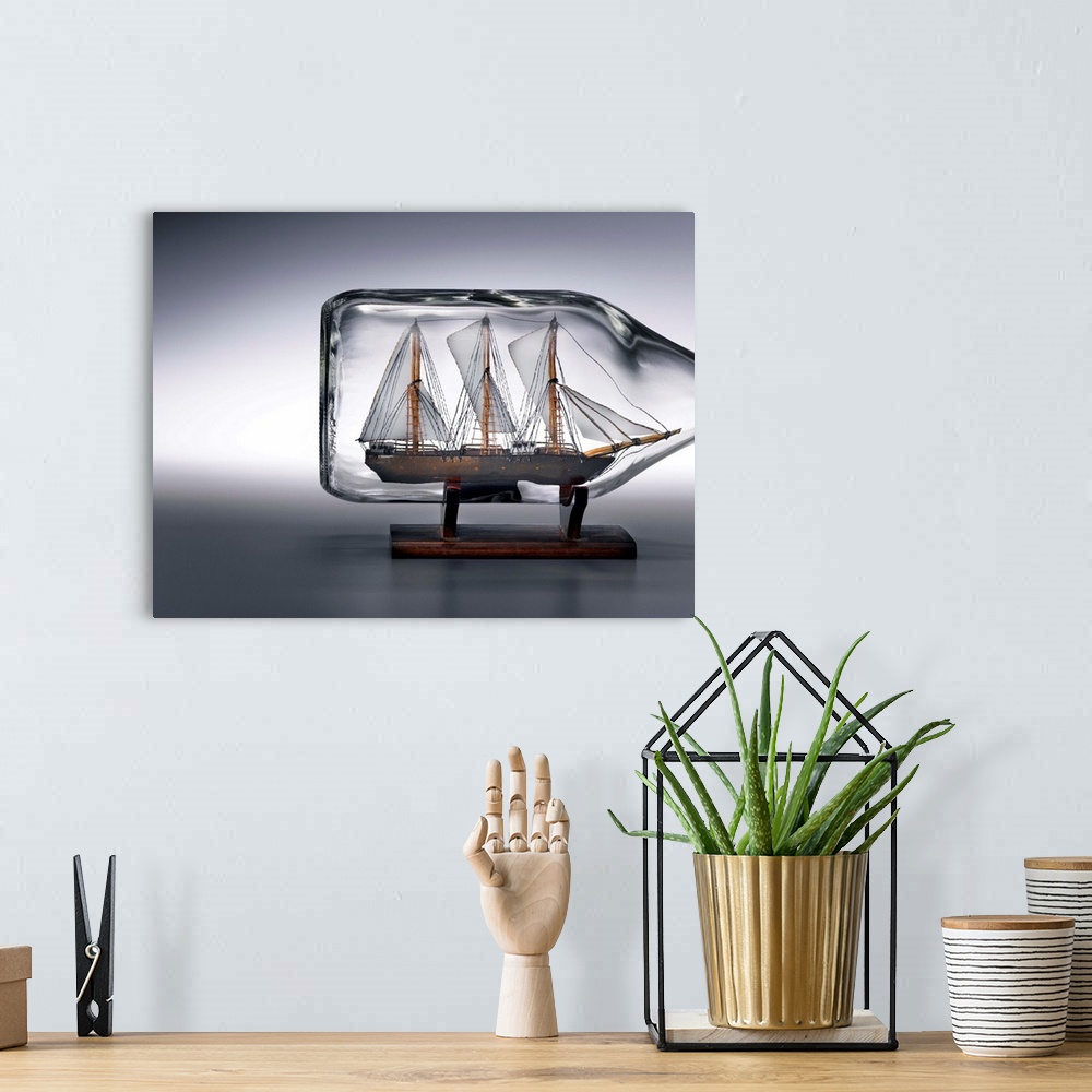A bohemian room featuring Sailing ship in bottle