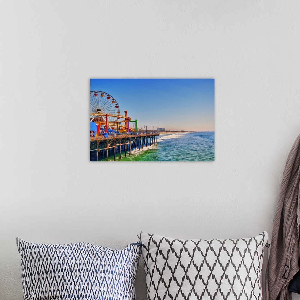 A bohemian room featuring View over to Pacific Park, family amusement park with large Ferris wheel at Santa Monica Pier in ...