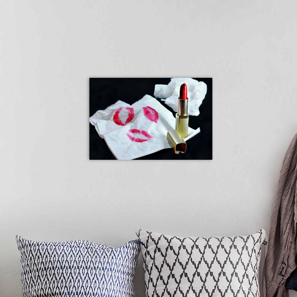 A bohemian room featuring Still Life of red lipstick and napkin with lipstick stains.
