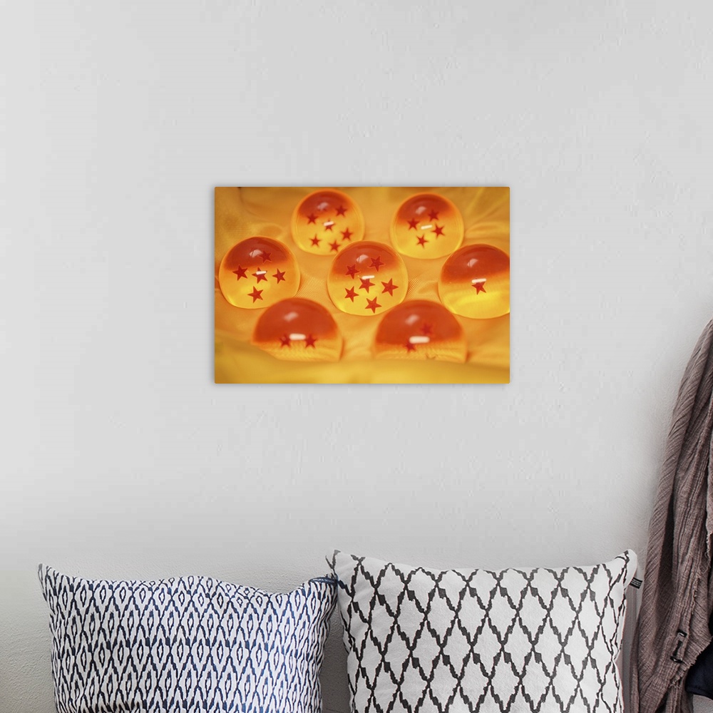 A bohemian room featuring Set of seven orange crystal dragon ball with stars.