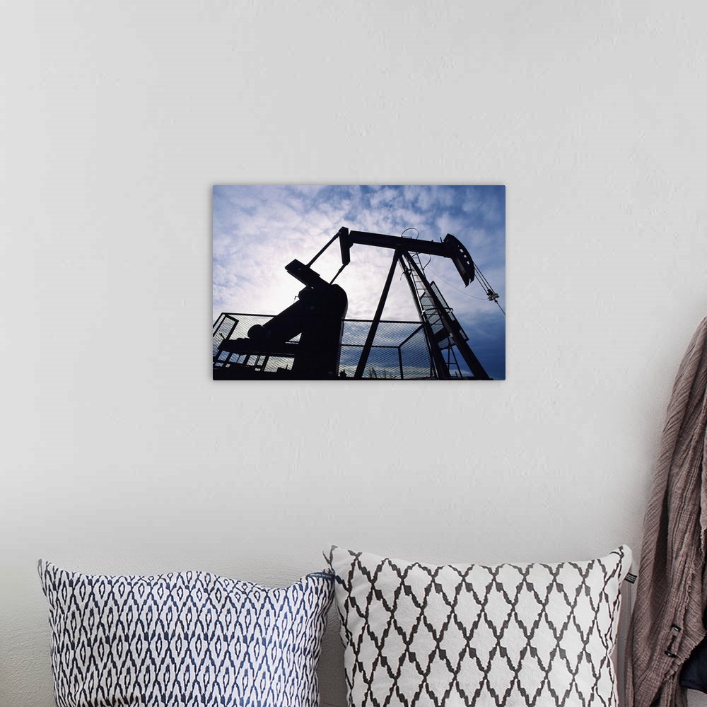 A bohemian room featuring Silhouette of oil derrick