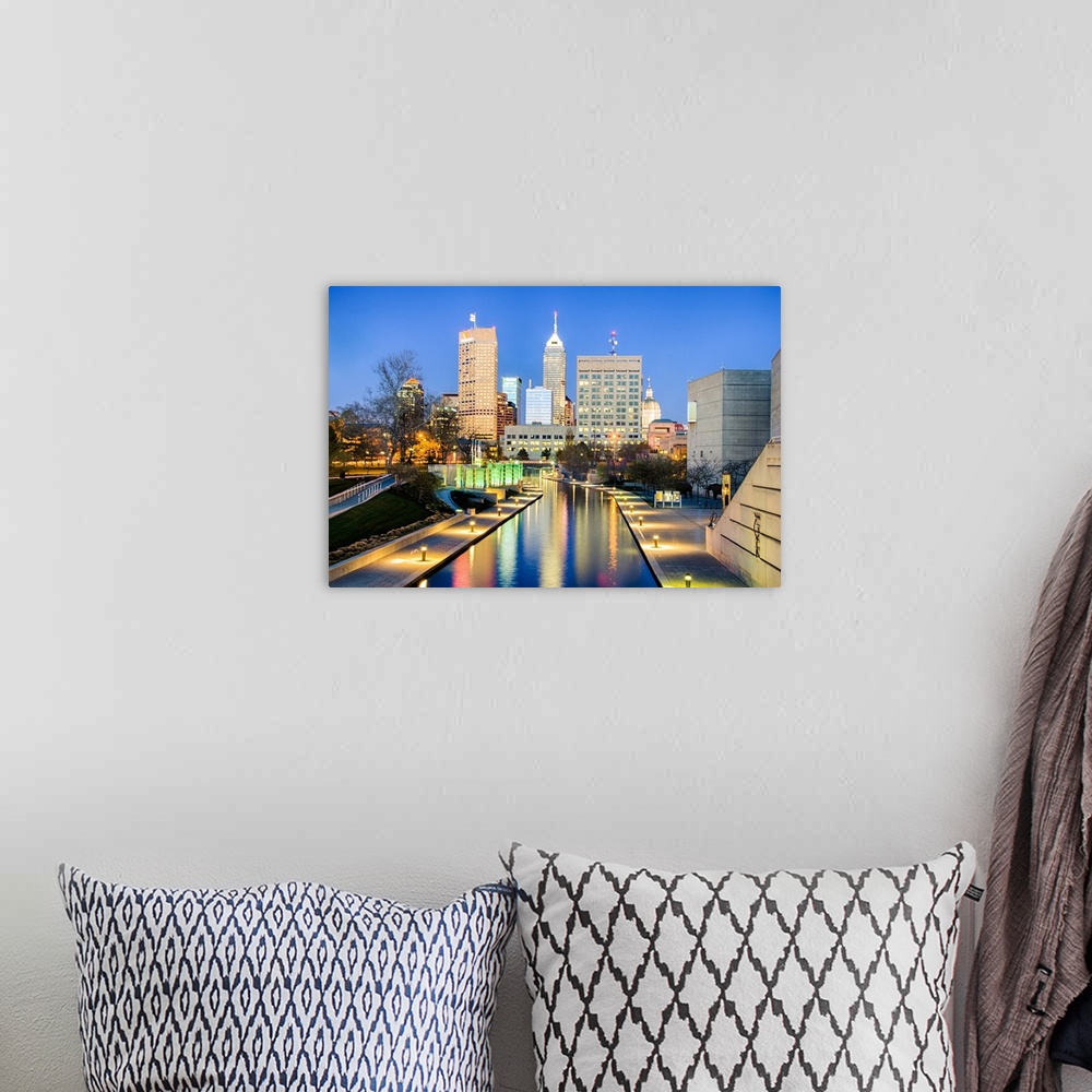 A bohemian room featuring Downtown Indianapolis reflecting on the canal.